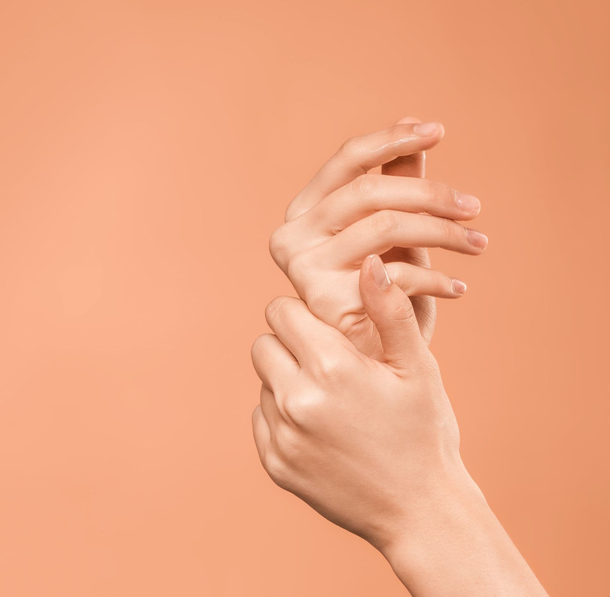 Can dry fasting heal streatch marks and loose skin - hands on the orange background
